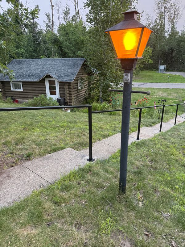 Custom Steel Handrail Installed Along Concrete Walkway in Bemidji