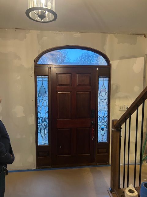 Elegant Entryway Transformation: M&M Contractors' Masterful Remodel