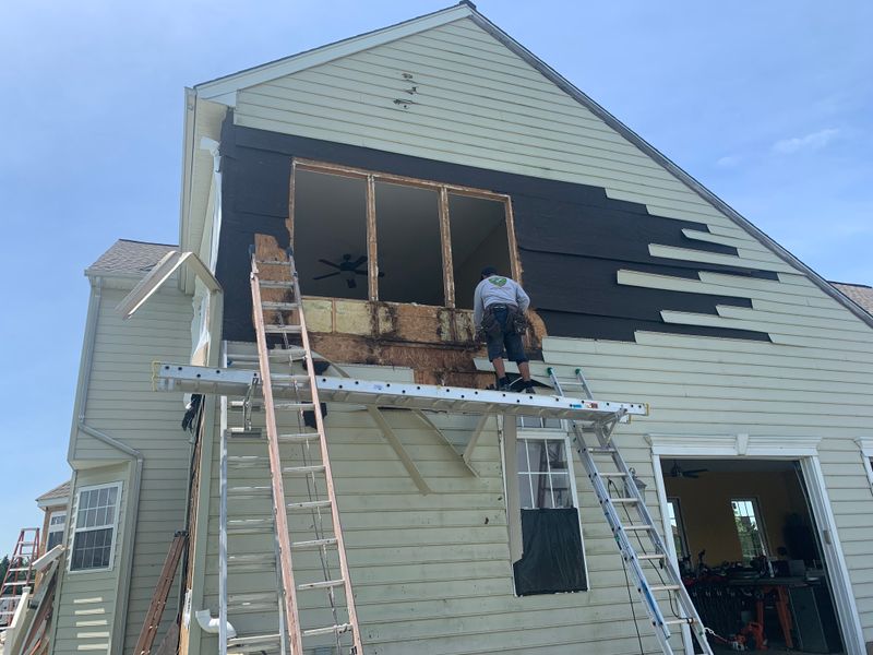 Laxs dr - windows, siding 