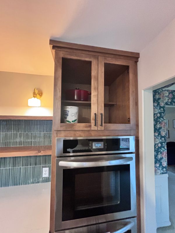 Elegant Kitchen Transformation by Mitten Made Basements