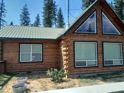 Reviving Rustic Charm: Inchelium Log Home Transformation with Expert Staining and Finishing Techniques