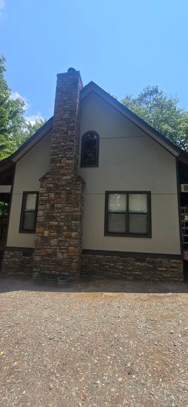 Fort Mountain replaced siding and painted the housw