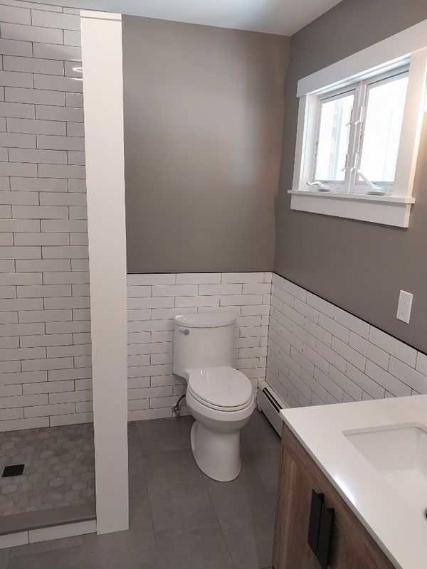 Elevating Elegance: Sayville Bathroom Transformation by New Vision Contracting