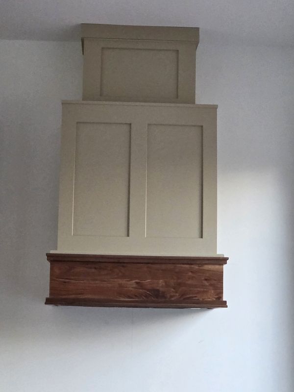 Elevating Kitchen Elegance: Custom Range Hood Masterpiece by Carolina Woodworks