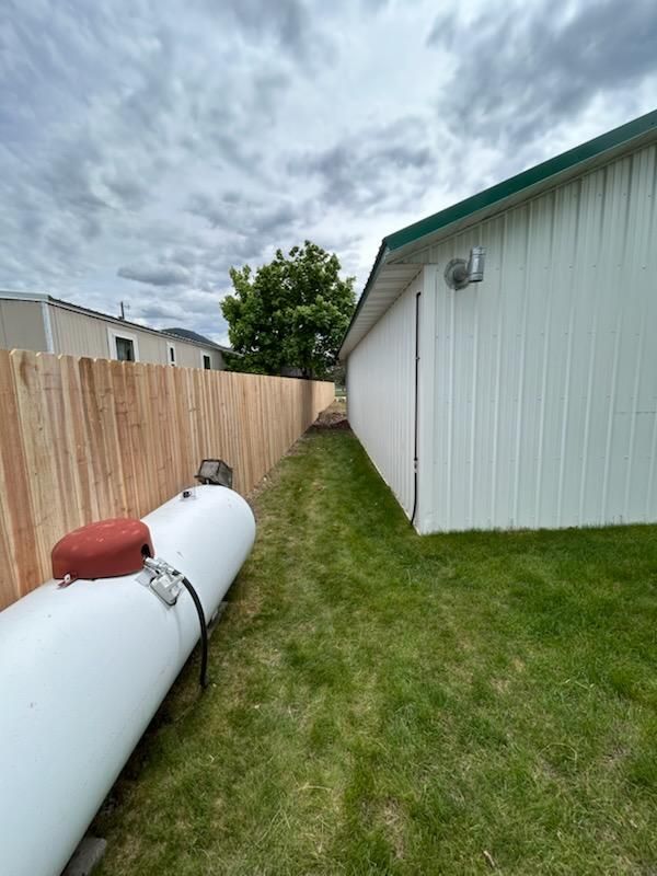 Enhanced Privacy and Elegance: J&S Development’s Timber Fence Transformation