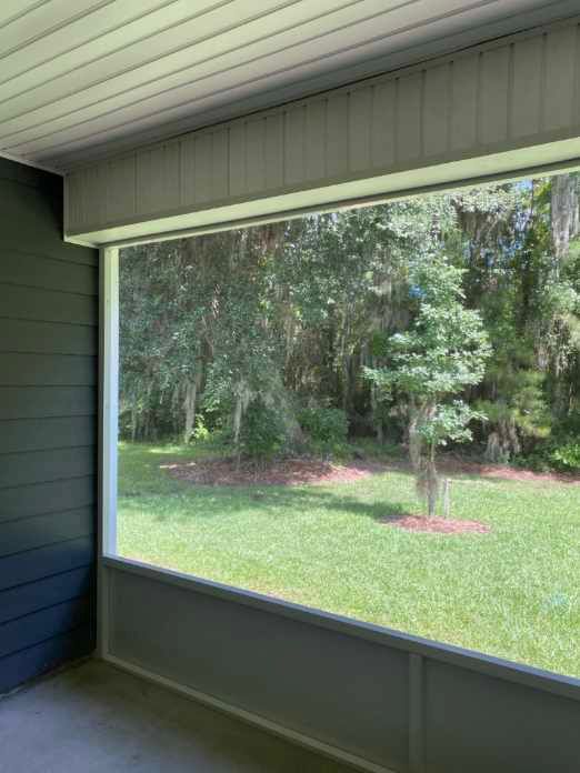 Elegant Outdoor Comfort: Screened-In Porch Transformation in Richmond Hill, GA