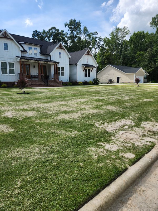 RightLane Turf Management top dressing with sand