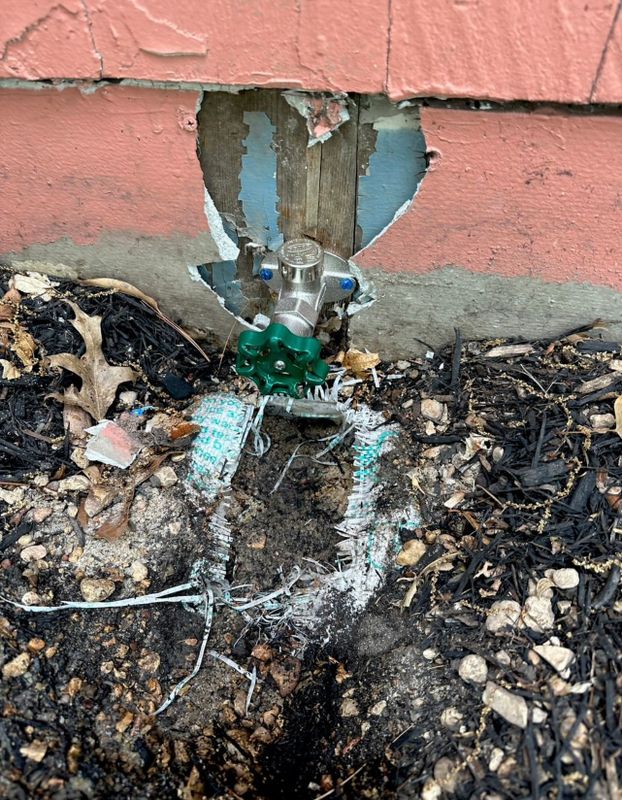 New outdoor faucet (hose bib) installed on a home's siding