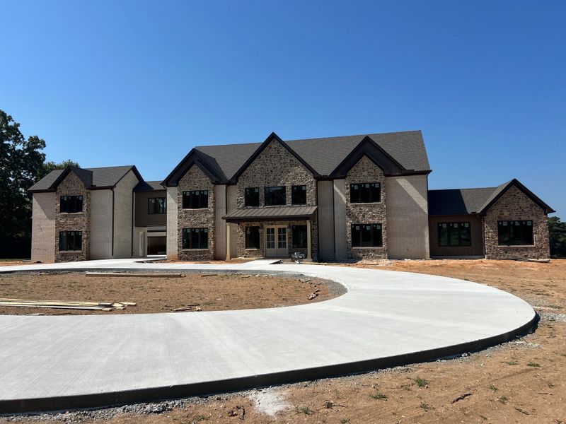 Crafting Elegance: Transformative Stonework for a Luxury Home Facade