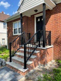 Transformative Entryway Elegance: Brick & Iron Mastery