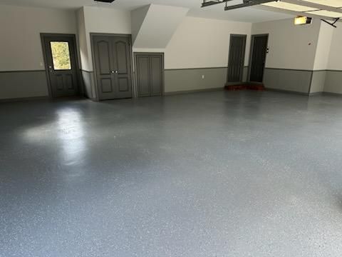 Revitalized Elegance: Cornerstone Painting Transforms Garage Floors and Steps in Monroe, Georgia