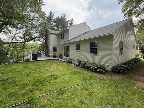 Exterior aluminum siding painted