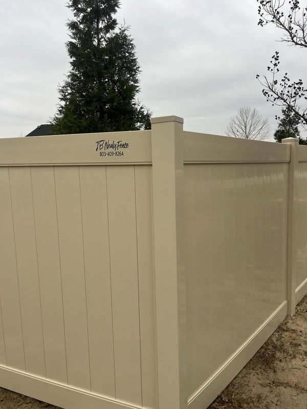 "Lugoff Elegance: Transforming Homes with JB Nealy's Durable Tan Vinyl Fencing"