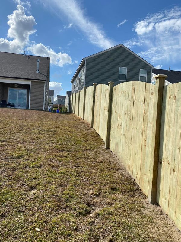 "Elevating Elegance: Stunning Arched Wood Fence Installation in Elgin, SC by JB Nealy Fence"