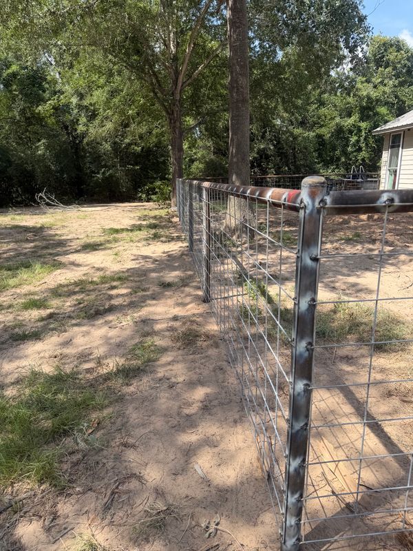 Custom Pipe fencing, entrances and riding arena