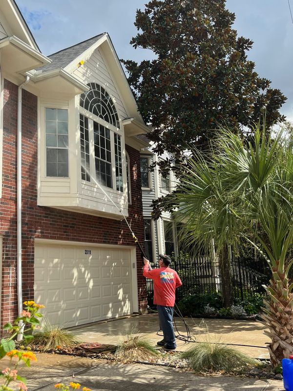 Pressure washing and soft washing