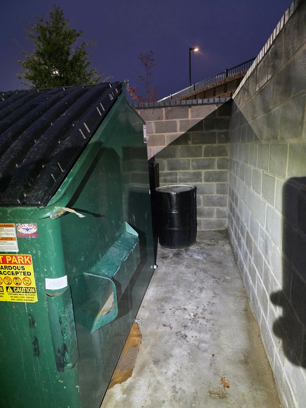 Dumpster Enclosure Clean Up