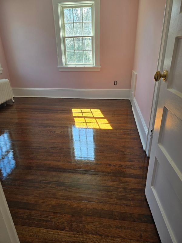 Elevating Elegance: Stunning Hardwood Refinishing and Vibrant Wall Transformations