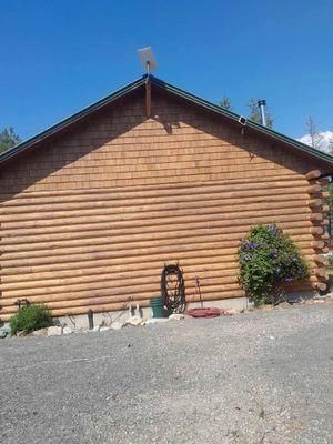 Reviving Rustic Charm: Inchelium Log Home Transformation with Expert Staining and Finishing Techniques