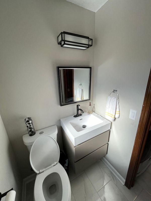 Elegance Redefined: Bathroom Remodel by Dutton Plumbing on Mystic Springs Drive