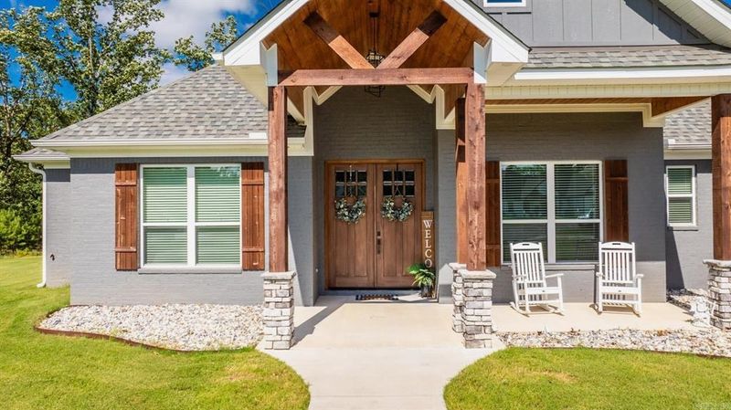 Crafting Elegance: Stone Work's Mastery Unveiled with Provia Silverlake Chisel Cut at 3055 Vincintage Cove, Alexander, AR