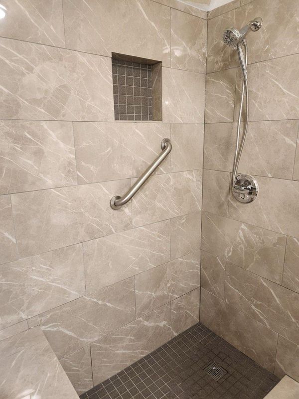 Transforming Safety and Comfort: Stand-In Shower Renovation by Mr. Mendez's Construction in Country Lake Estates, Spring, TX