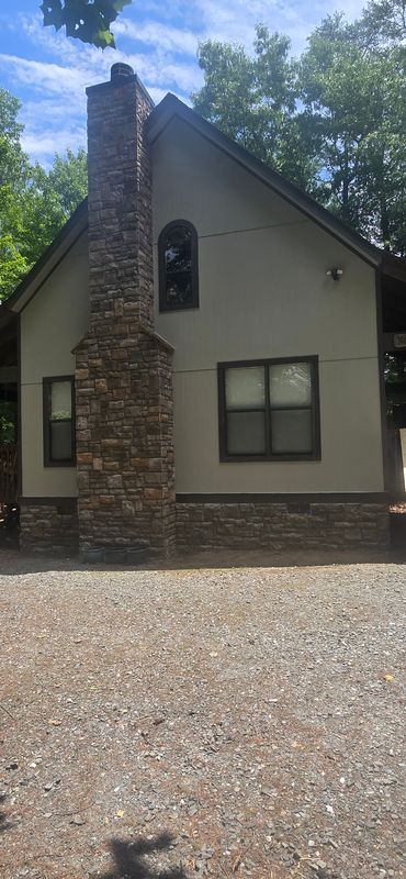 Fort Mountain replaced siding and painted the housw