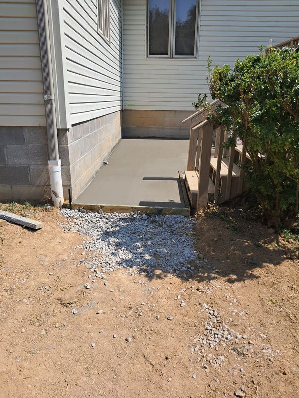Concrete pad and Grill Hut