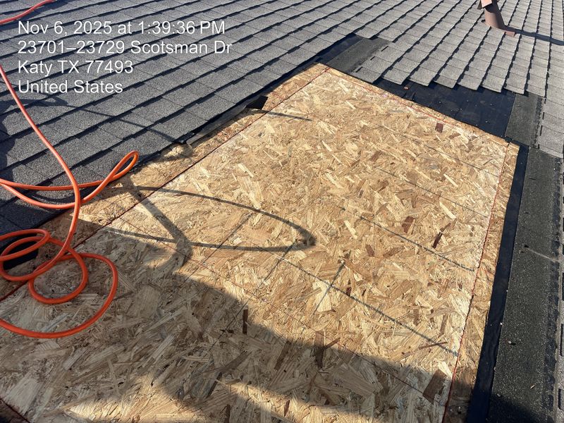 Roof tarping and minor roof repairs