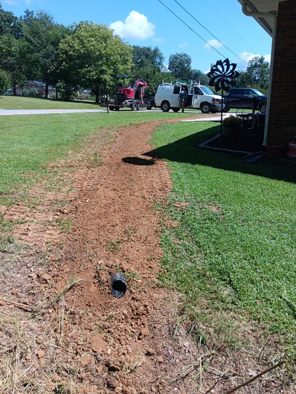 Dirt work and French drains