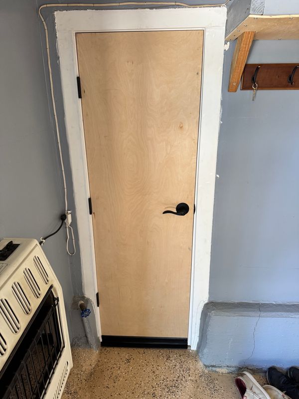 Custom Door Install for a Non-Standard Garage-to-Kitchen Opening