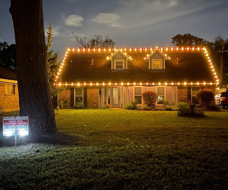"Radiant Holiday Elegance: North Star's Classic Red & Warm White Display in Taylor Lake, TX"