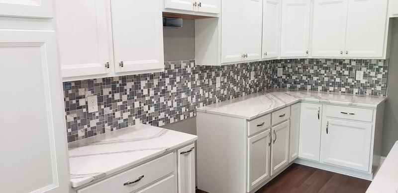 Mirror Marvel: Transformative Tile Framing in The Villages Kitchen Backsplash