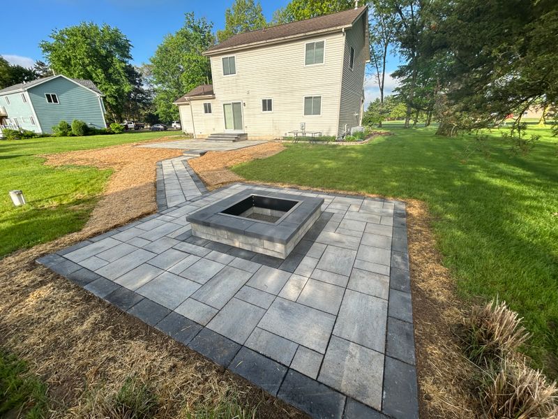 Enchanting Outdoor Oasis: Transformative Landscaping Project in Brighton, MI