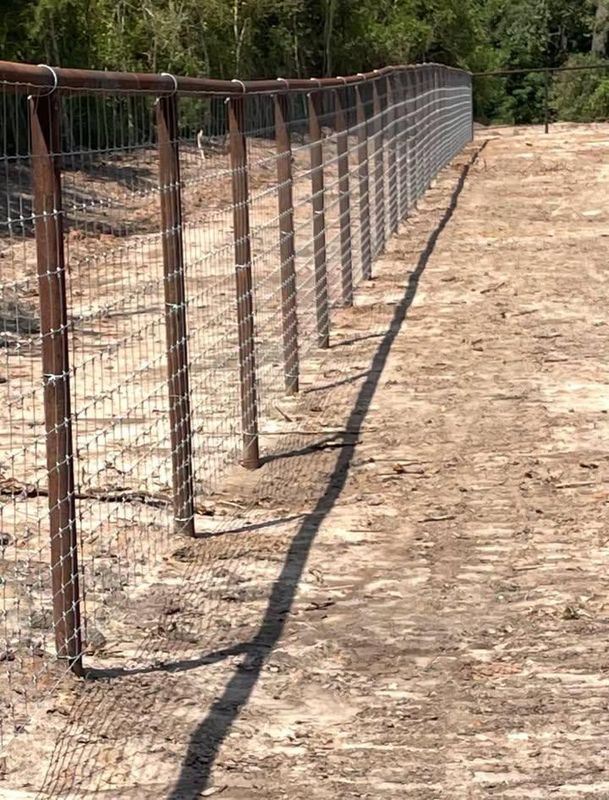 Custom Pipe fencing, entrances and riding arena