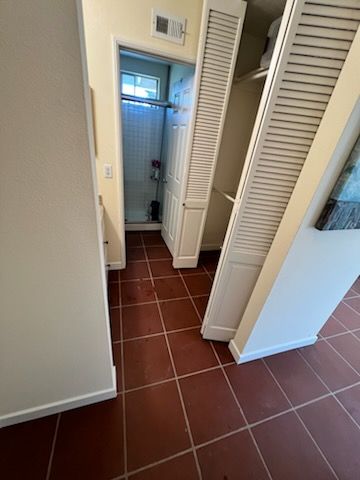 Santa Clarita Flood Restoration: Stunning Paver-Look Flooring Transformation by Dave Walter Flooring
