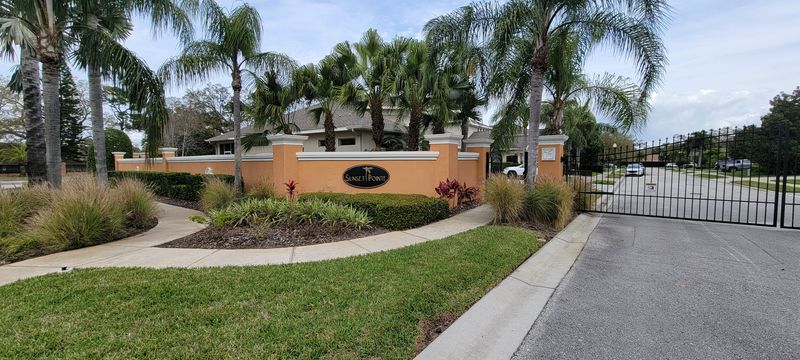 Transforming Clearwater: Blue Stream's Premier Sidewalk and Privacy Wall Pressure Washing at Sunset Pointe