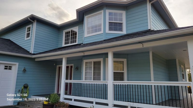 Transforming Exteriors: A Refreshing Blue Makeover by American Europe Painting LLC