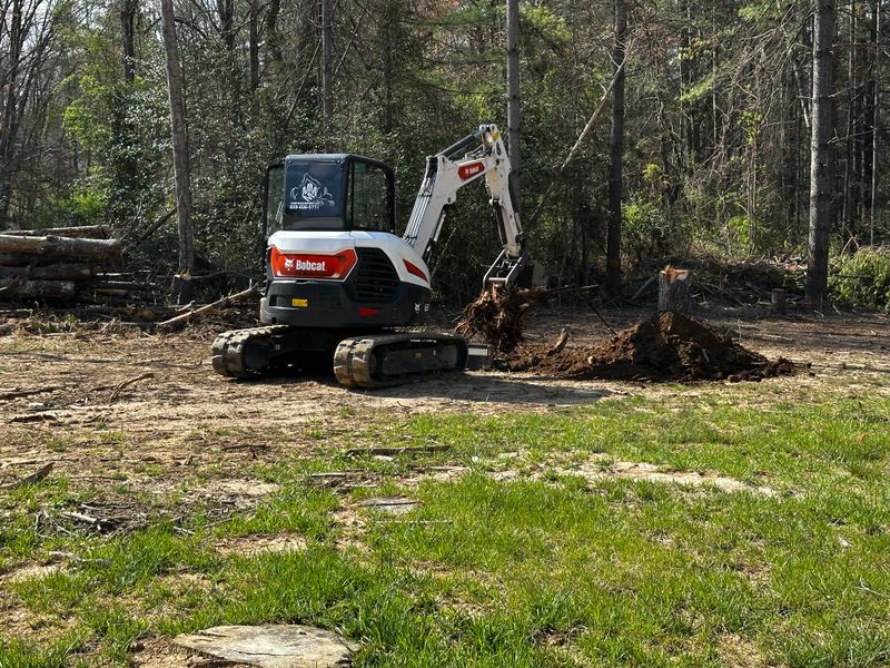 "Transforming Terrain: Triple M Land Management's Precision Excavation and Concrete Excellence"