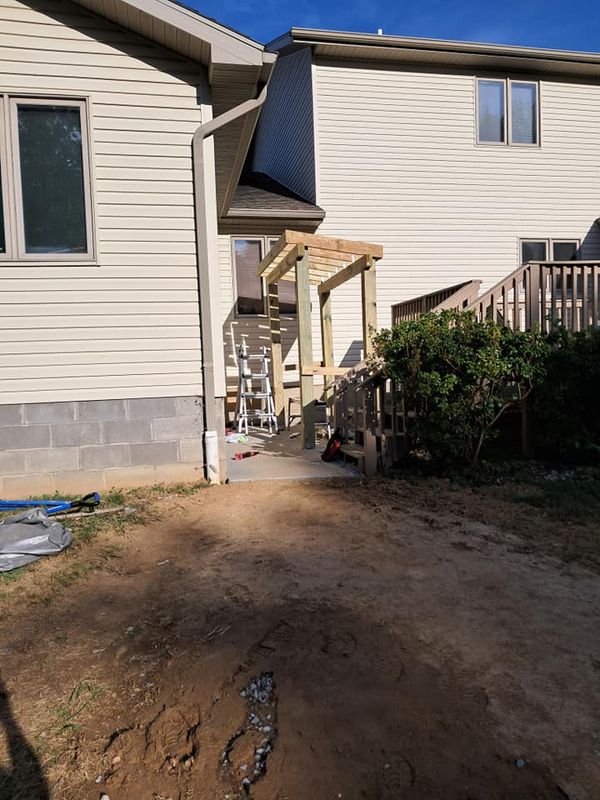 Concrete pad and Grill Hut