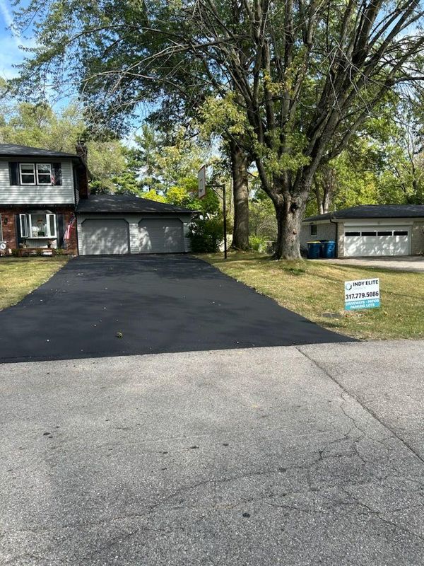 Woodland Springs Driveway Revival: Expert Seal Coating and Repaving in Carmel, IN