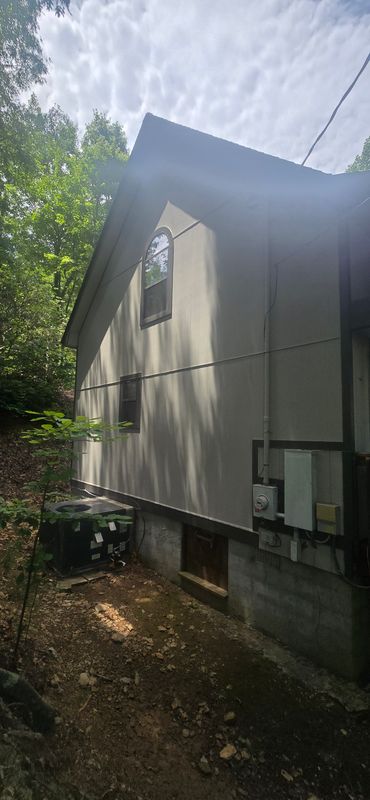 Fort Mountain replaced siding and painted the housw