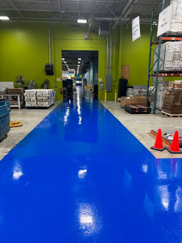 Brilliant Blue Transformation: Durable Epoxy Flooring for NJ Industrial Spaces