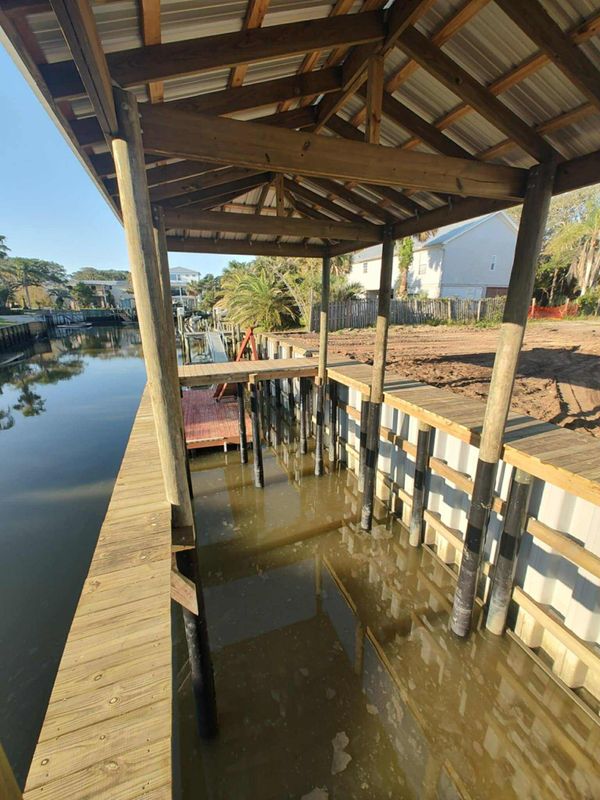 Waterfront Transformation: Stunning Dock and Seawall Construction by Cast Away Homes LLC