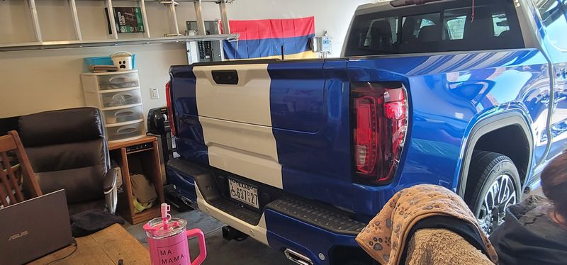 Blue and white GMC