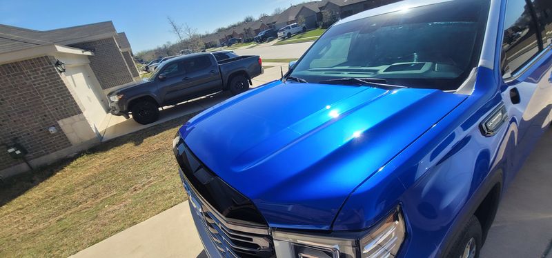 Blue and white GMC