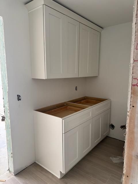 Elegant Kitchen and Living Space Transformation by Start 2 Finish LLC Contracting Services