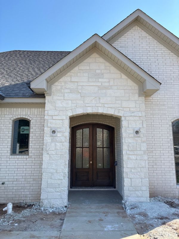 Elevate Your Home's Curb Appeal with Stone Works' Expert Masonry Entrance