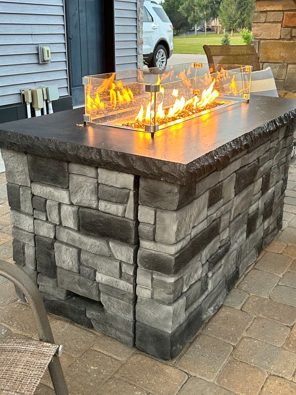 Outdoor kitchen and living spaces.