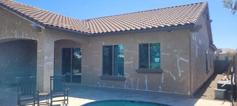 Transforming Exteriors with Precision: A Poolside Painting Project